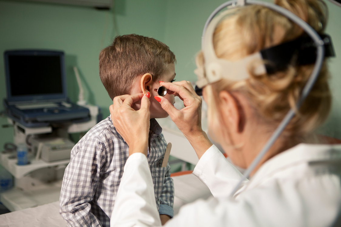 Boy at otolaryngologist's office